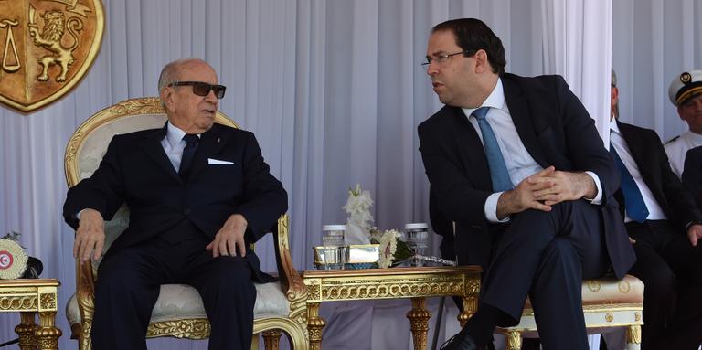 FETHI BELAID / AFP Tunisian President Beji Caid Essebsi (left) and Prime Minister Youssef Chahed in Tunisia on June 25, 2018.