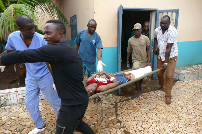 Un homme blessé par des tirs à Conakry, en Guinée, le 7 novembre 2018.