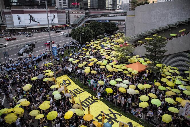 Manifestation du « mouvement des parapluies » dans les rues de Hongkong contre le pouvoir chinois et pour davantage de démocratie, en 2014.