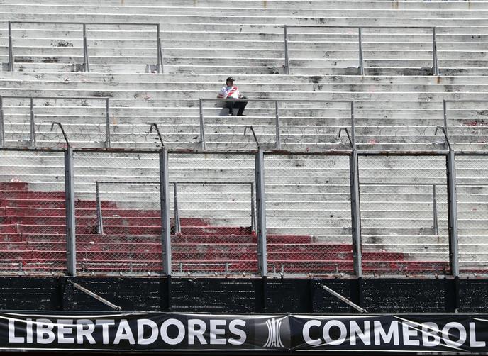 A supporter of the River Plate at the Monumental stadium, November 25.