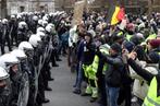 Demonstrators face riot police during the "yellow vests" protest against higher fuel prices, in Brussels, Belgium, December 8, 2018. REUTERS/Yves Herman