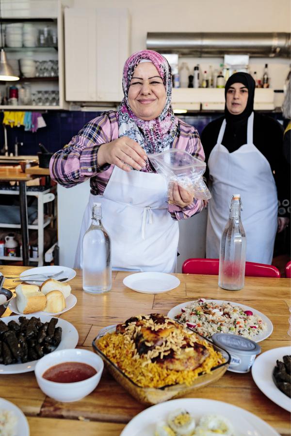 The Depanneur welcomes Syrian refugees who prepare dishes that are sold online (here, Ghana, Alabdullah and Ahd Alobi).