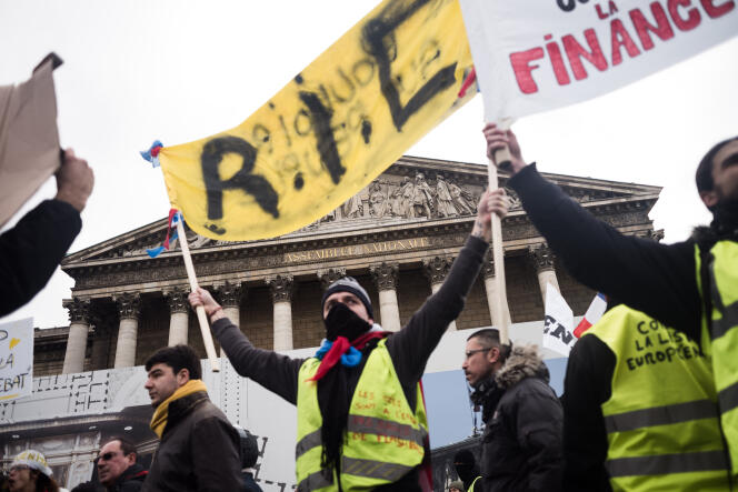 La manifestation de l’acte XI de mobilisation du mouvement des « gilets jaunes » devant l’Assemblée nationale à Paris, le 26 janvier.