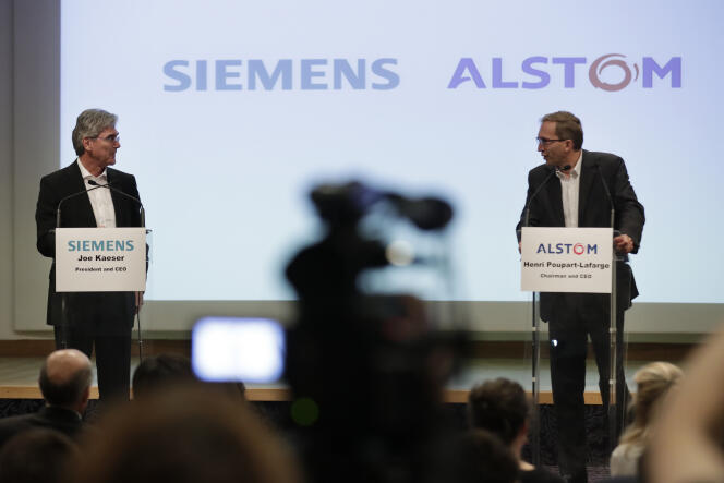 Le patron de Siemens, Joe Kaeser (à gauche) et le PDG d’Alstom, Henri Poupart-Lafarge lors de la conférence de presse annonçant la fusion des deux groupes, à Paris, le 27 septembre 2017.