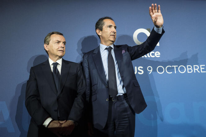 Alain Weill, président d’Altice France (qui devient l’actionnaire majoritaire à titre personnel de « L’Express »), et Patrick Drahi, président du groupe Altice, à Paris, en octobre 2018.