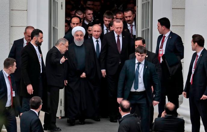 Les présidents Vladimir Poutine (Russie), Recep Tayyip Erdogan (Turquie) et Hassan Rohani (Iran) réunis pour une discussion trilatérale à propos de la Syrie, à Sotchi, le 14 février.