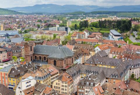 Overview of old town and Saint Christoph cathedral, viewed from citadel Belfort city, Franche-Comté, France, Europe.