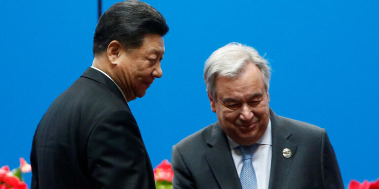 Secretary General of the United Nations Antonio Guterres returns to his seat after delivering a speech as Chinese President Xi Jinping stands next to him at the opening ceremony for the second Belt and Road Forum in Beijing, China April 26, 2019.  REUTERS/Florence Lo - RC1BBEB1B830