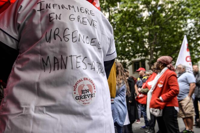 Manifestation des personnels de l’hôpital, à Paris, le 11 juin.