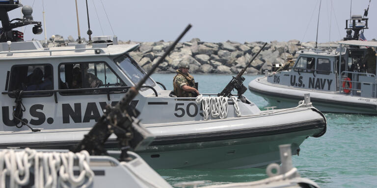 U.S. Navy patrol boats carrying journalists to see damaged oil tankers leaves a U.S. Navy 5th Fleet base near Fujairah, United Arab Emirates, Wednesday, June 19, 2019. The limpet mines used to attack a Japanese-owned oil tanker near the Strait of Hormuz bore 