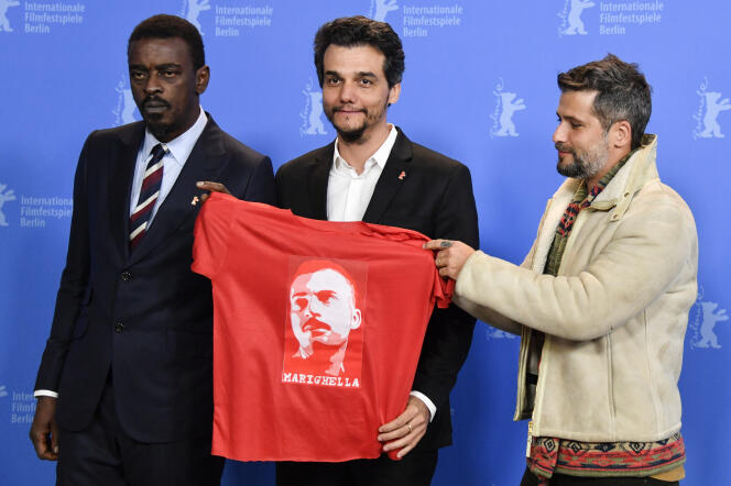 Seu Jorge (à gauche), Wagner Moura (au centre), et le réalisateur brésilien Bruno Gagliasso lors du Festival de Berlin, le 15 février 2019 pour le film « Marighella », du nom d’un militant brésilien du Parti communiste mort en 1969.