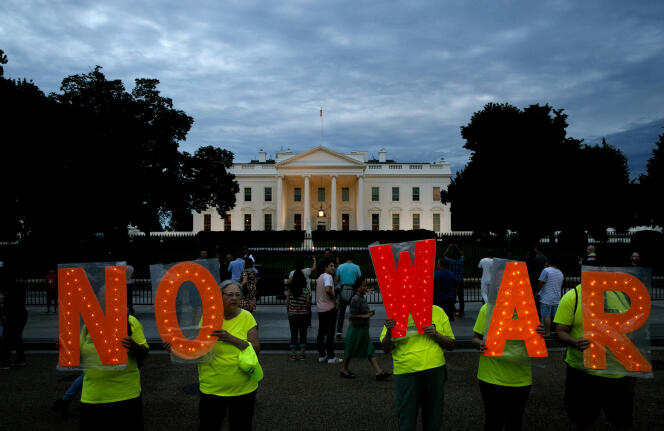 Des manifestants protestent contre la possibilité d’une guerre avec l’Iran, devant la Maison Blanche, le 20 juin.