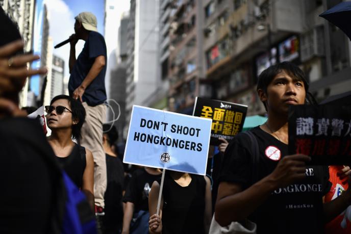 Des habitants de Hongkong manifestent pour demander le retrait du projet de loi assouplissant les conditions d’extradition vers la Chine, dimanche 21 juillet.