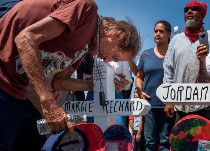In the United States, a carpenter builds thousands of crosses in tribute to the victims of shootings