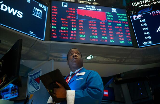 Un trader du New York Stock Exchange le 5 août.