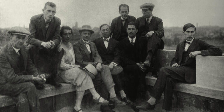 Bayer, Herbert,
1900–1985,
Austrian and American graphic designer, painter, photographer, sculptor and architect, who was widely recognized as the last living member of the Bauhaus and was instrumental in the development of the Atlantic Richfield Company's corporate art collection until his death in 1985.

Group photo of the Bauhausmeister on the roof of the Bauhaus building in Dessau:
From left to right: Josef Albers, Marcel Beuer, Gunta Stölzl, Oskar Schlemmer, Wassily Kandinsky, Walter Gropius, Herbert Bayer, Lázló Moholy-Nagy, Hinnerk Scheper.

Photo, Walter Gropius with self-timer, Dessau 1926.