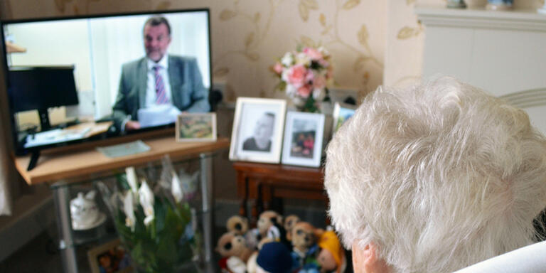09 July 2019, Great Britain, London: 93-year-old Irene sits in her living room in front of the television. In Great Britain, there is a heated debate about the recent decision of the BBC to re-invest over 75-year-olds in radio licence fees. From June 2020, they will also have to pay the 154.50 pounds (equivalent to around 172 euros) annually. Since 1999, senior citizens have been excluded. Photo: Christoph Meyer/dpa (Photo by Christoph Meyer/picture alliance via Getty Images)