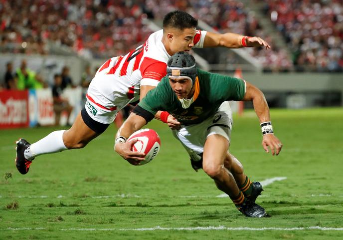 Cheslin Kolbe (en vert) est l’atout n° 1 de l’équipe sud-africaine des Springboks, qui comptent parmi les favoris de la Coupe du monde de rugby 2019. Ici, lors d’un match contre le Japon à Kumagaya, le 6 septembre 2019.