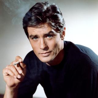 French actor Alain Delon on the set of The Yellow Rolls-Royce directed by British Anthony Asquith. (Photo by Sunset Boulevard/Corbis via Getty Images)