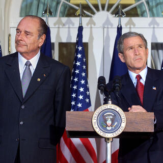 US President George W. Bush (R) and French President Jacques Chirac (L) pause during a press availability on the steps of the Rose Garden after their meeting in the Oval Office of the White House 06 November 2001 in Washington, DC. Bush and Chirac discussed solutions to combat terrorism globally and the conflict in Afghanistan.   AFP PHOTO/Stephen JAFFE (Photo by STEPHEN JAFFE / AFP)