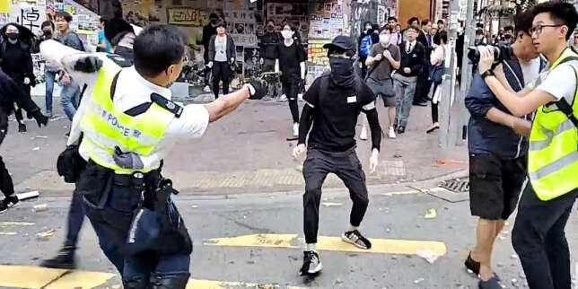 Journée de violence à Hongkong : un manifestant blessé par balle, un homme transformé en torche humaine