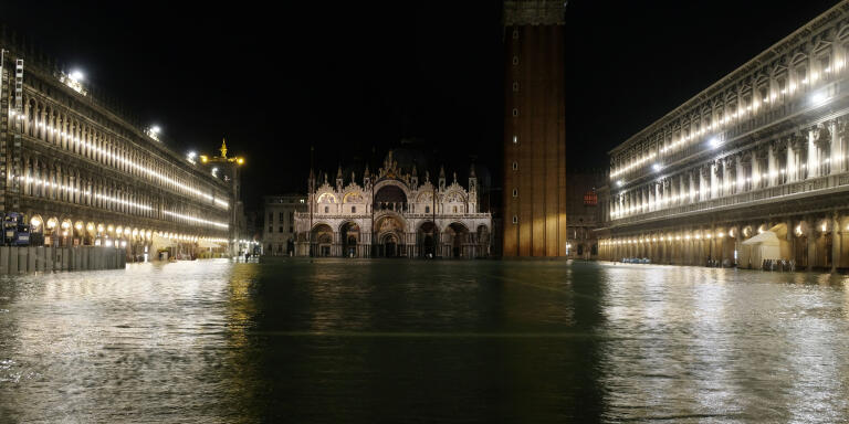 A flooded St.Mark's Square is pictured during a period of seasonal high water in Venice, Italy November 12, 2019. REUTERS/Manuel Silvestri
