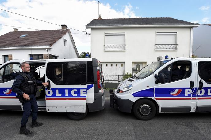 Police in front of the Truec family's home in Orville, near Nantes, in April 2019. The four family members were killed at home on February 16, 2017.