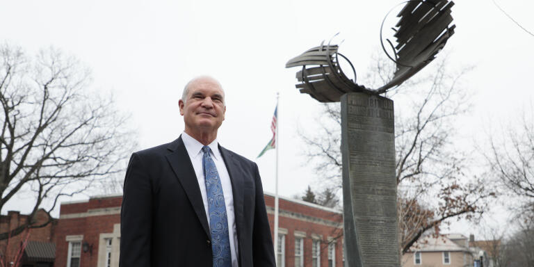 Bruce Bailey, law director for the City of Westerville, poses for a portrait near the sculpture 