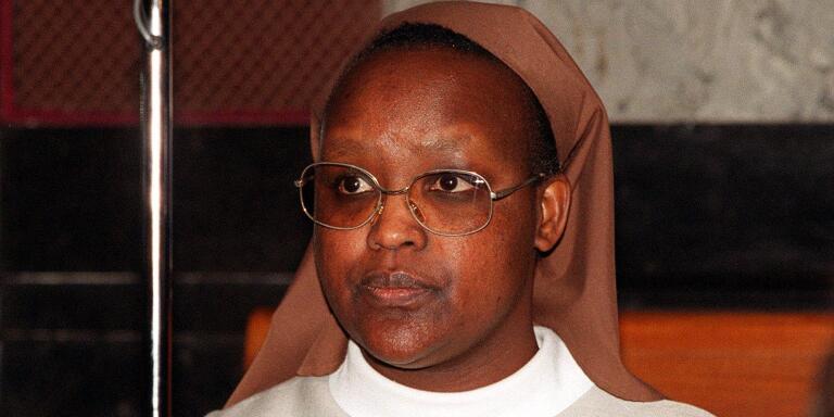 Benedictine Sister Gertrude, 42, born Consolata Mukangango, appears in front of a criminal court in Brussels, Tuesday April 17, 2001. Jury selection began Tuesday in a landmark trial at which four Rwandans, including two Roman Catholic nuns, face charges of aiding and abetting the murder of Tutsis as part of the genocide that swept the Central African nation in 1994. Sister Gertrude forced hundreds of Tutsis hiding in her convent to leave knowing they were going to be killed. Some 600 died on May 5, the prosecution alleges. Sister Gertrude asked officials to remove the last remaining 30 Tutsis who were then killed May 6.(AP Photo/Thierry Charlier)