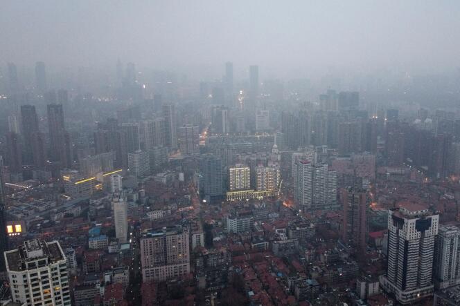 Une vue aérienne de la zone résidentielle et commerciale de Wuhan, province de Hubei le 27 Janvier.