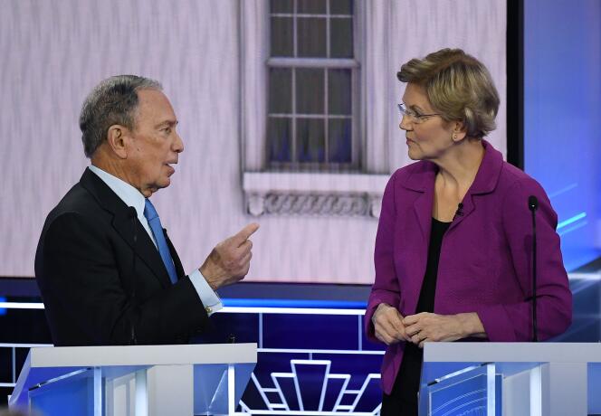 Les candidats à la primaire démocrate Michael Bloomberg et Elizabeth Warren lors d’une pause, durant le débat du 19 février à Las Vegas.