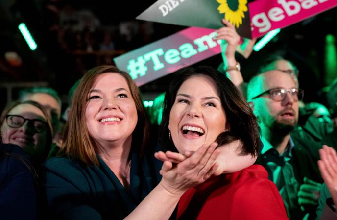 Katharina Fegebank (left) is satisfied with the good results of the Greens for which she was a candidate in the regional elections, in Hamburg, Sunday, February 23.