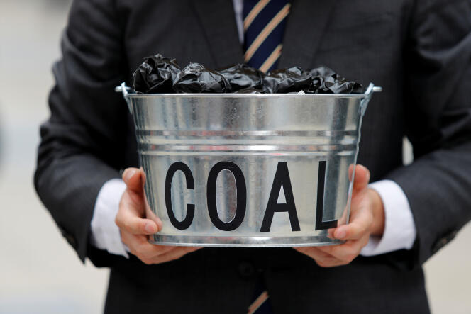 Lors d’une manifestation contre le recours au charbon, lors du sommet du G20, à Osaka, au Japon, en juin 2019.