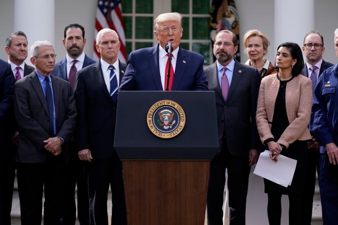 Le président américain Donald Trump lors d’une conférence de presse sur le coronavirus dans les jardins de la Maison Blanche, le vendredi 13 mars 2020, à Washington.