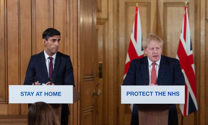 Le premier ministre britannique, Boris Johnson (à droite), et le chancelier de l’Echiquier, Rishi Sunak, lors d’une conférence de presse au 10 Downing Street, à Londres, le 20 mars.