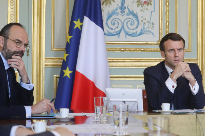 Edouard Philippe et Emmanuel Macron, à Paris, le 19 mars.
