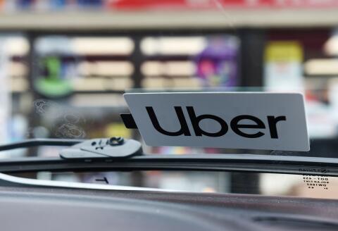 FILE PHOTO: An Uber sticker is seen on driver Margaret Bordelon's car in Lafayette, Louisiana, U.S. February 16, 2020. Picture taken February 16, 2020. REUTERS/Callaghan O'Hare/File Photo