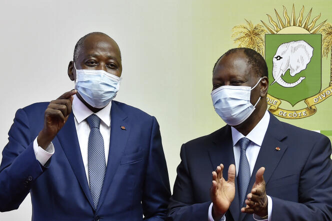 Le premier ministre ivoirien Amadou Gon Coulibaly (à gauche) en compagnie du chef de l’Etat Alassane Ouattara, à Abidjan, le 2 juillet 2020.