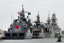 A picture taken on February 18, 2020 shows Turkish, Greek, Italian and Canadian North Atlantic Treaty Organization (NATO) warships moored at the port of La Goulette in the Tunisian capital Tunis. - In a press release published today, the Tunisian Ministry of National Defense clarified that Tunisia is a transit zone like other countries and added that the four ships which are in Tunisia for routine docking and logistical checks obtained prior authorization in accordance with the legal procedures for mooring during the period of February 17 to 21, 2020. (Photo by FETHI BELAID / AFP)