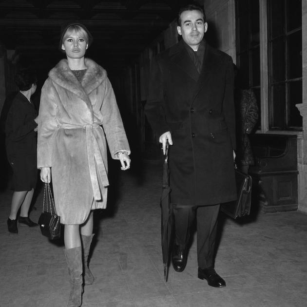Brigitte Bardot in front of the Palais de Justice, with her lawyer, Robert Badinter, on November 21, 1962.