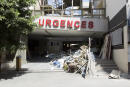 Rubble is placed at the emergency entrance of les Soeurs du Rosaire hospital in Beirut, Lebanon, Saturday, August 8, 2020. 