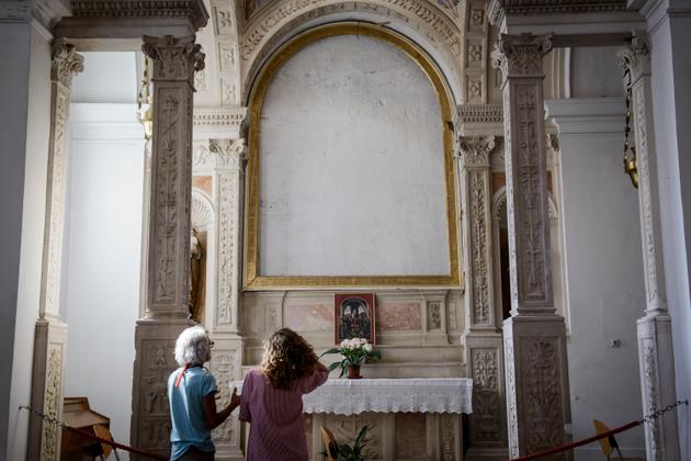 A Piran en Slovénie, dans l’église de Saint François, le 14 juillet. Dans cet espace vide se trouvait un tableau de Vittore Carpaccio (1465-1512), « mis à l’abri » par les fascistes italiens en 1940 à Padoue, quand Piran était encore l’Italie, et jamais restitué.