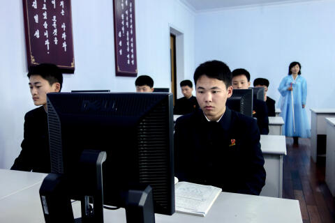 PYONGYANG, NORTH KOREA - 2012/01/21: Young students learn computer technology in a middle school, which is supposed to be specially open to tourists. (Photo by Zhang Peng/LightRocket via Getty Images)