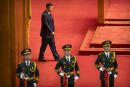 Chinese President Xi Jinping, rear, arrives for an event to honor some of those involved in China's fight against COVID-19 at the Great Hall of the People in Beijing, Tuesday, Sept. 8, 2020. Chinese leader Xi Jinping is praising China's role in battling the global coronavirus pandemic and expressing support for the U.N.'s World Health Organization, in a repudiation of U.S. criticism and a bid to rally domestic support for Communist Party leadership. (AP Photo/Mark Schiefelbein)