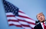 TOPSHOT - US President Donald Trump speaks at a "Great American Comeback" rally in Fayetteville, North Carolina, on September 19, 2020. / AFP / Brendan Smialowski 