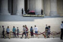 WASHINGTON, DC -- 9/23/20 -- Ruth Bader Ginsburg lies in state at the entrance to the Supreme Court as the public pays their respects.
With the death of Supreme Court Justice Ruth Bader Ginsburg on September 18, the court has lost its leading progressive voice. Members of the public pay their respects and answer the question, "what are the issues you are most worried about since the passing of Ruth Bader Ginsberg?".…by André Chung #_AC22415