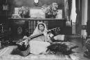 This handout picture received from Shrabani Basu at the Noor Inayat Khan Memorial trust on November 8, 2012 shows late former British secret agent Noor Inayat Khan playing a Veena. A statue of Noor Inayat Khan was unveiled in Gordon Square Gardens, central London on November 8, 2012 in London, England by Princess Anne. Noor Inayat Khan worked as a radio operator for the Women's Auxiliary Air Force before being recruited by the Special Operations Executive as an agent, working behind enemy lines in Paris, France. She was eventually captured, tortured and beaten before being executed at Dachau Concentration Camp, aged 30. “ RESTRICTED TO EDITORIAL USE - MANDATORY CREDIT " AFP PHOTO / Noor Inayat Khan Memorial trust/Shrabani Basu " - NO MARKETING NO ADVERTISING CAMPAIGNS - DISTRIBUTED AS A SERVICE TO CLIENTS ” (Photo by HO / Noor Inayat Khan Memorial trust / AFP)