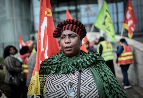 Chamber maids of the Ibis Batignolles Hotel demonstrate, on October 17, 2019 outside the Accor headquarters in Paris, on the day marking the third month of their strike to call for to call for better working conditions. (Photo by STEPHANE DE SAKUTIN / AFP)