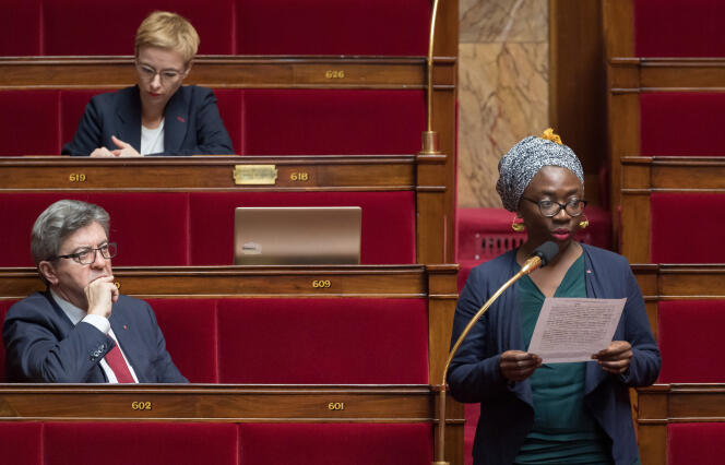 La députée (LFI) de Paris, Danièle Obono, et Jean-Luc Mélenchon, à l’Assemblée nationale, le 24 mars.