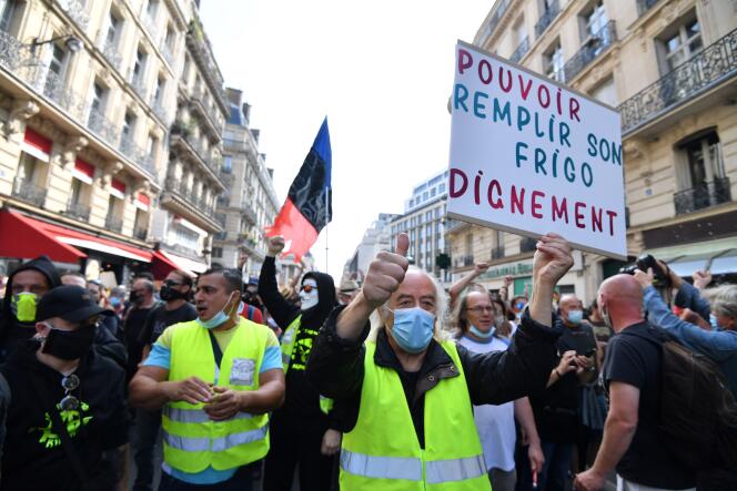 Lors d’une manifestation, à Paris, le 12 septembre.